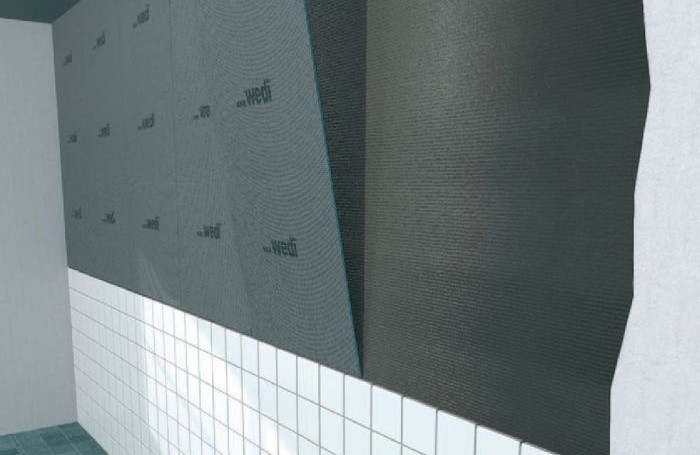 Le panneau mural prêt à carreler est une plaque pour recouvrir un carrelage mural irrégulier